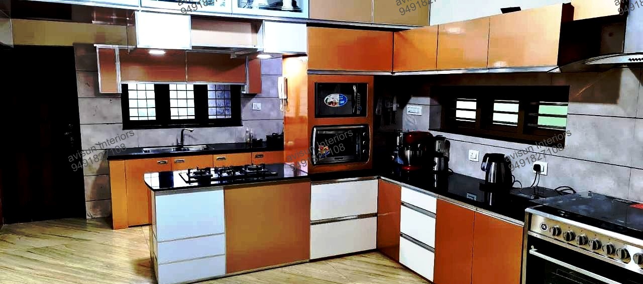 Aluminium modular kitchen with glossy finish and soft-close drawers in Vizag